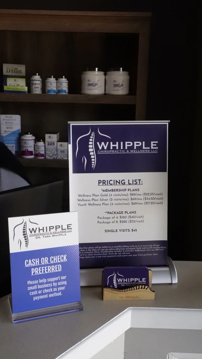 Whipple Chiropractic pricing list and payment sign